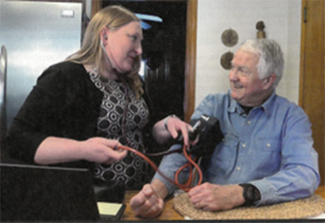 UnityPoint Health staff caring for a patient in their home